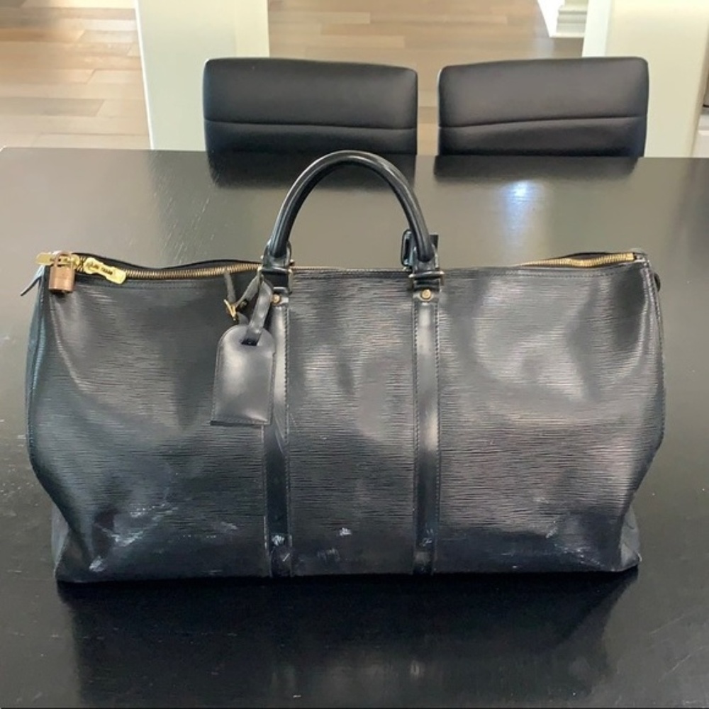 Louis Vuitton black Epi duffle bag